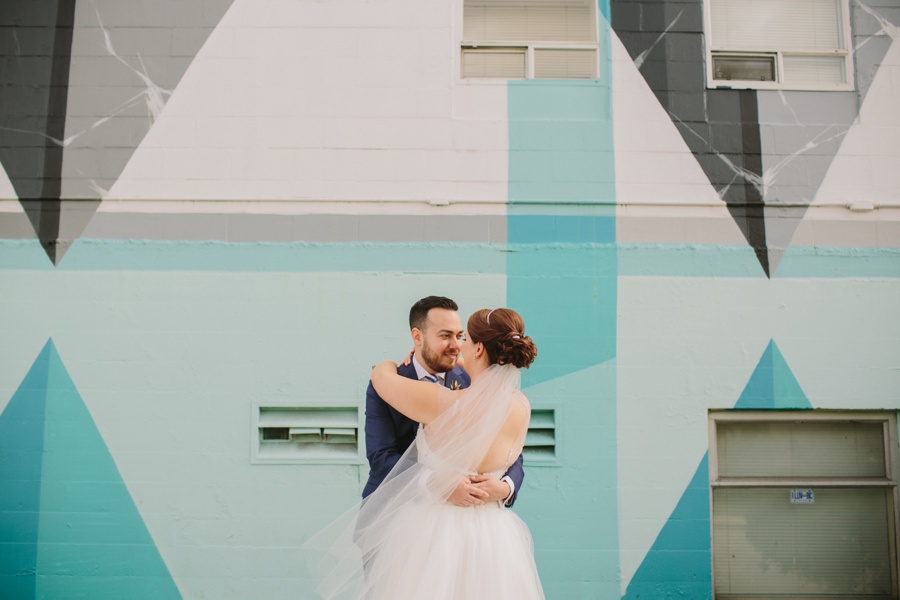 Bride and Groom Photos in front of Vancouver Mural