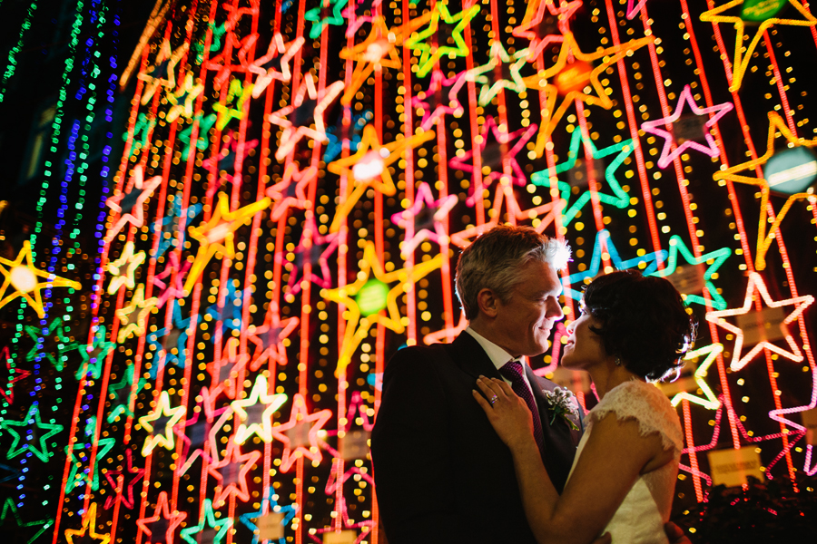 Christmas Eve elopement in Vancouver featuring christmas lights at night