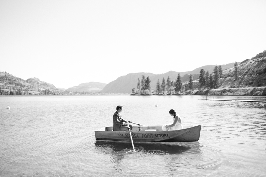Bride and groom in ponderosa point row boat