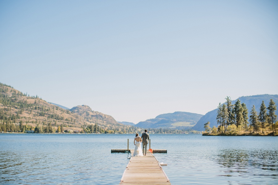 Bride and Groom Walking on dock at Lake Okanagan