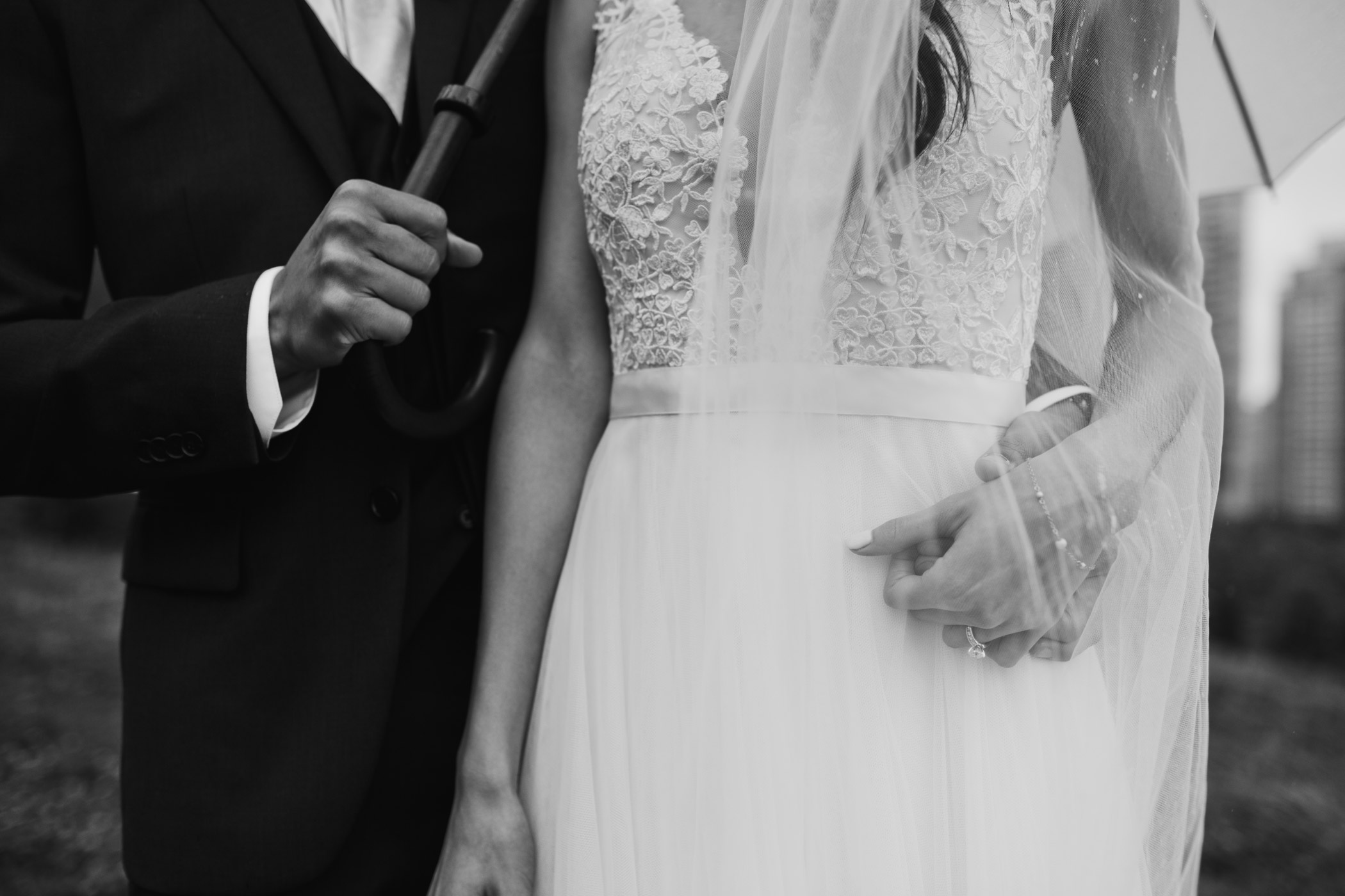 Bride and Groom in the rain