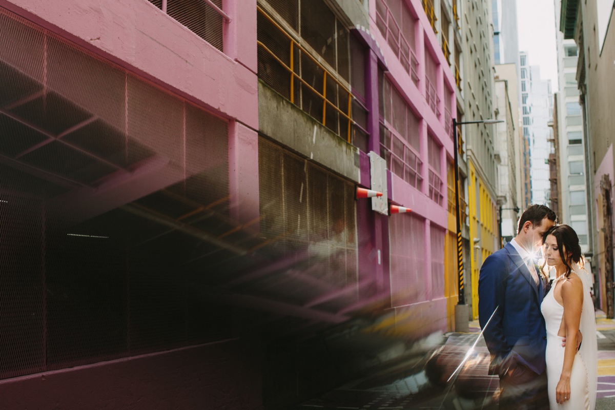 Bride and groom portrait in Vancouver's pink alley