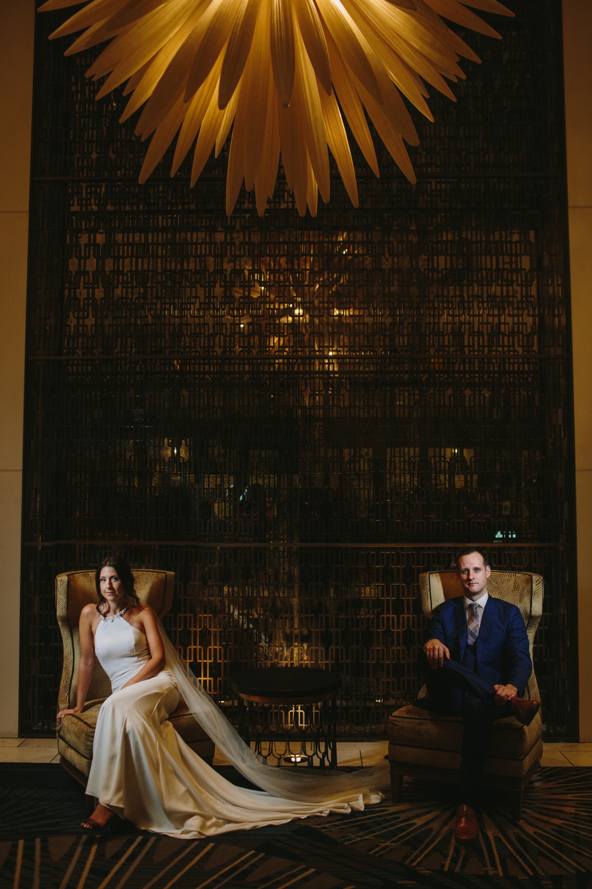 Wedding couple poses in Fairmont Hotel Vancouver