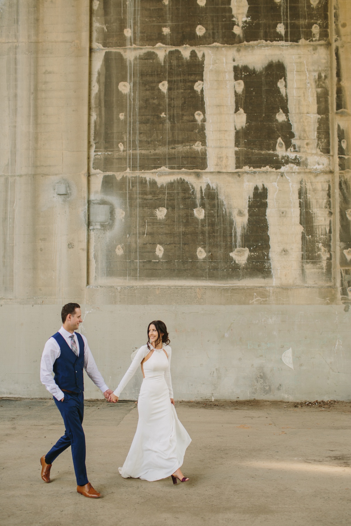 Bride and groom under Burrard Street Bridge